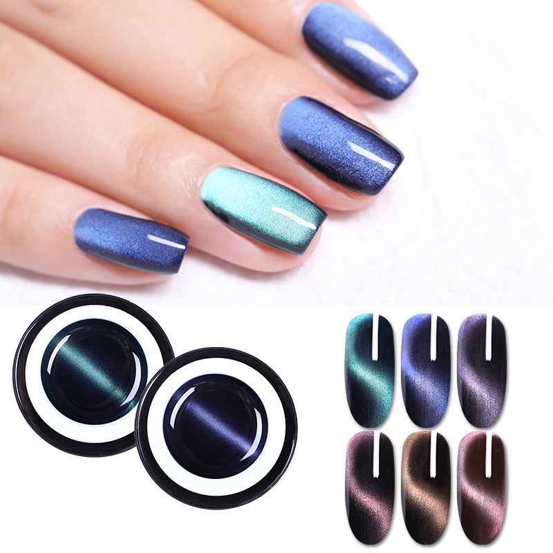 Nail polish with metallic blue and green finish on nails, alongside nail polish bottles and color swatches.