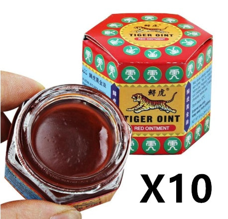 Tiger Balm red ointment jar with packaging on a white background