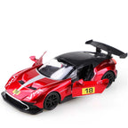 ASTON MARTIN Red toy race car with black accents on a white background