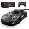 Gray Porsche-themed remote control car with a black box and remote control on a white background