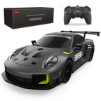 Gray Porsche-themed remote control car with a black box and remote control on a white background