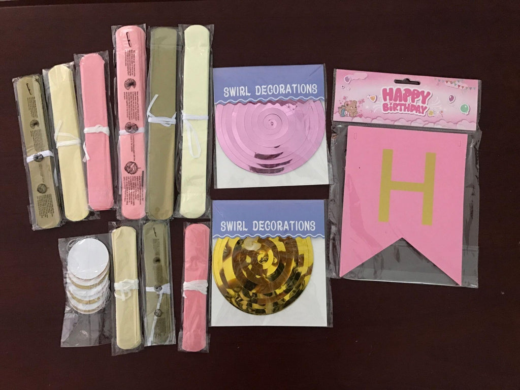 Cute pink paper party supplies and birthday backdrop decorations
