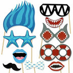 Ocean themed party selfie props with cute cartoon shark designs
