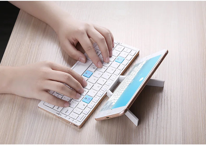 ⌨️📱 BOW Mini Folding Bluetooth Keyboard – 3 Device Support with Stand